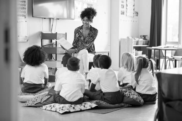 school children learning in classroom